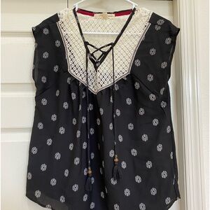 NWOT. Rewind top. Black and white. Size small.